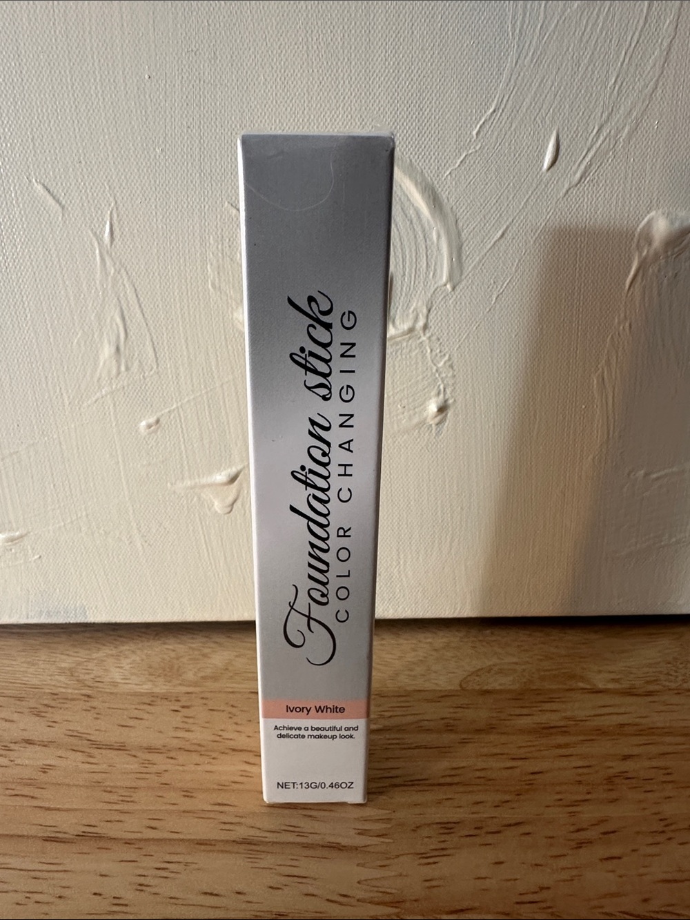 NIB Foundation Stick Color Changing - Ivory White includes applicator brush.